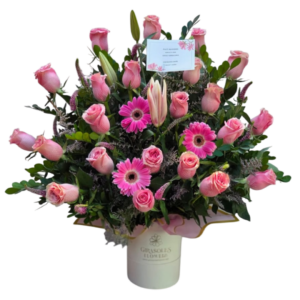 BOX DE ROSAS Y GERBERAS ROSADAS
